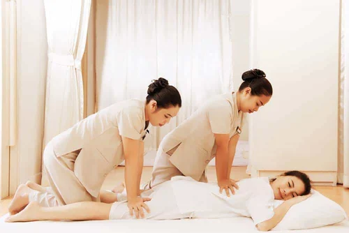 Traditional Thai massage four hand Thai Massage